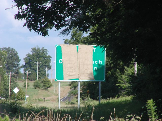 Covered signage on US 72 eastbound, just west of MS 302.